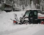 Gene Millers snow blower clearing the driveway ~ By Sanders LaMont